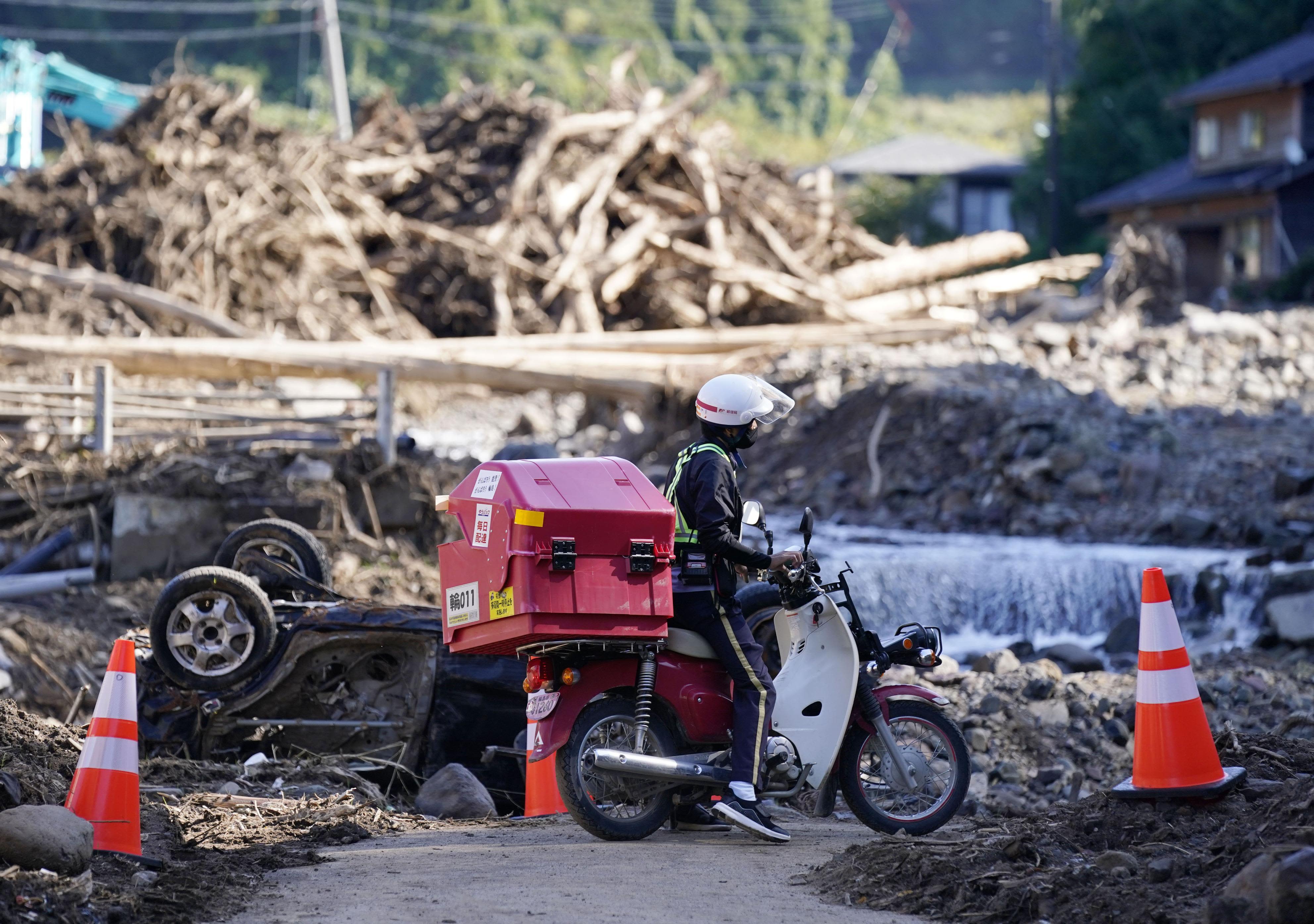 A mountain range with snow covered mountains in the background